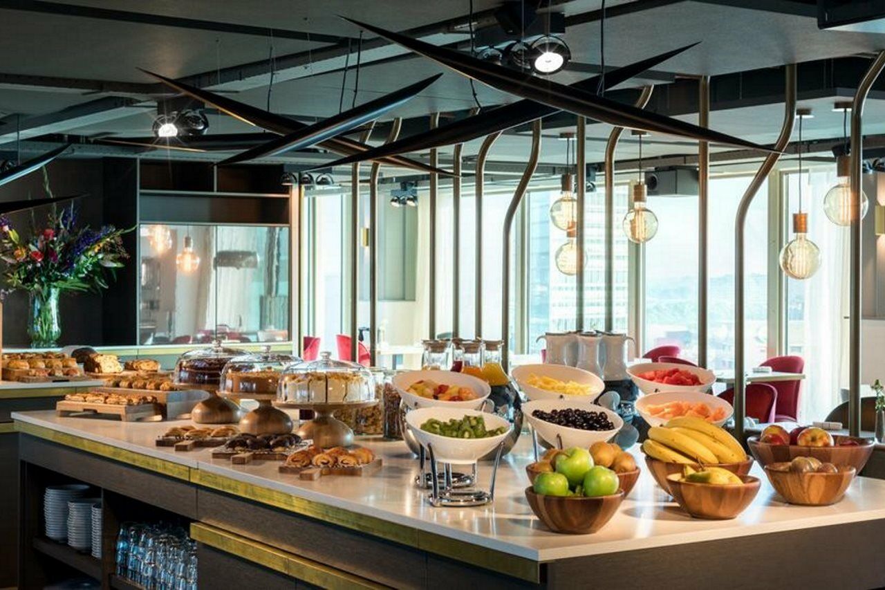 Hotel NH Collection Eindhoven Centre Extérieur photo The buffet at the lounge